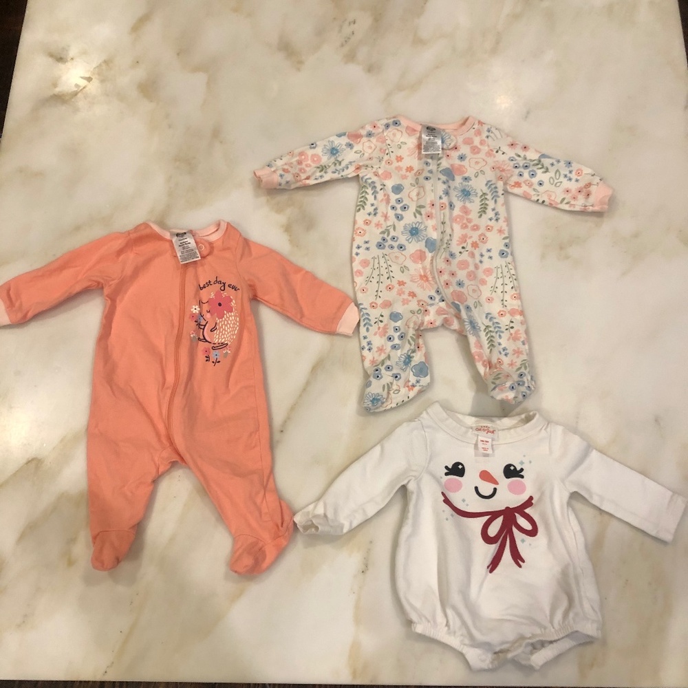 Bundle of footie pajamas and onsie